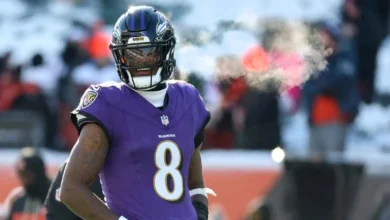 Dec 14, 2025; Cincinnati, Ohio, USA; Baltimore Ravens quarterback Lamar Jackson (8) warms up before the game against the Cincinnati Bengals at Paycor Stadium. M…