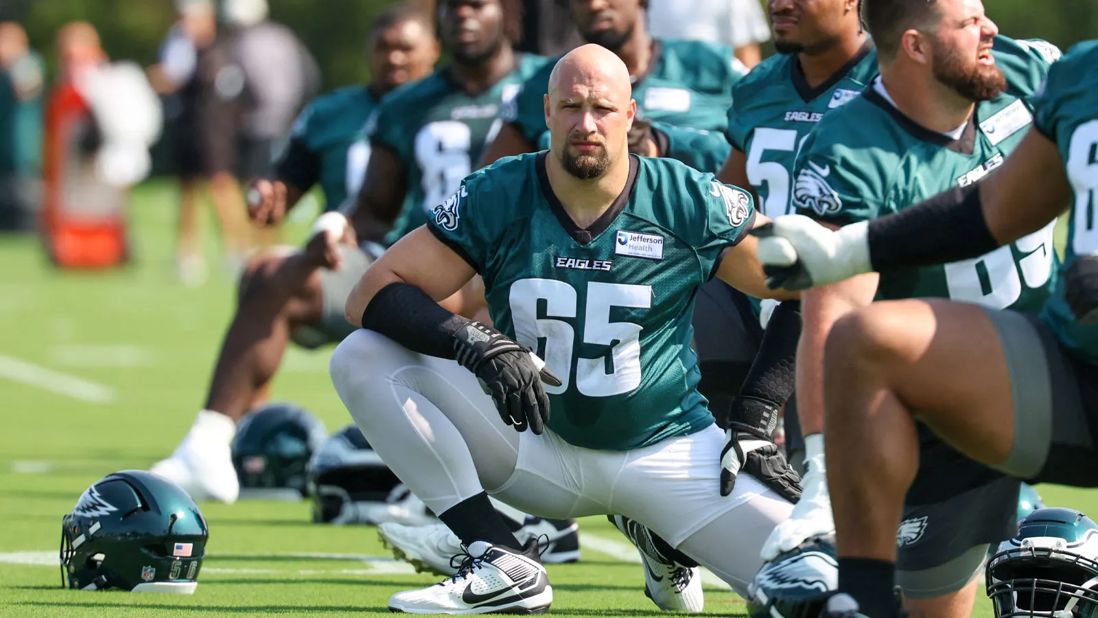 Jul 29, 2026; Philadelphia, PA, USA; Philadelphia Eagles tackle Lane Johnson (65) stretches during training camp at Jefferson Health Training Complex. Mandatory…