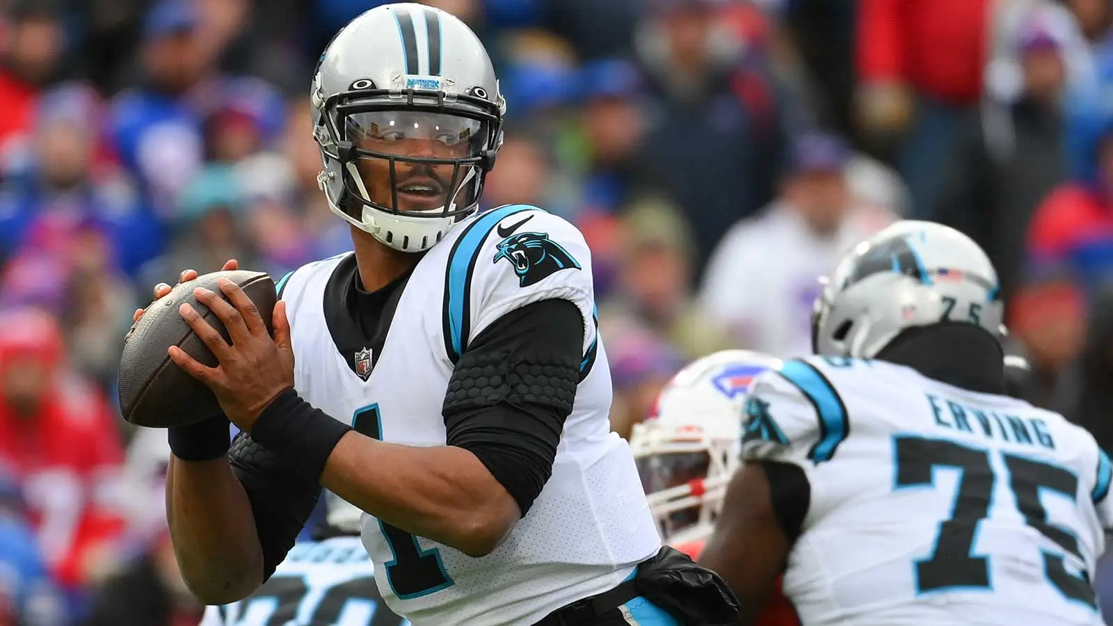 Dec 19, 2021; Orchard Park, New York, USA; Carolina Panthers quarterback Cam Newton (1) drops back to pass against the Buffalo Bills during the first half at Hi…