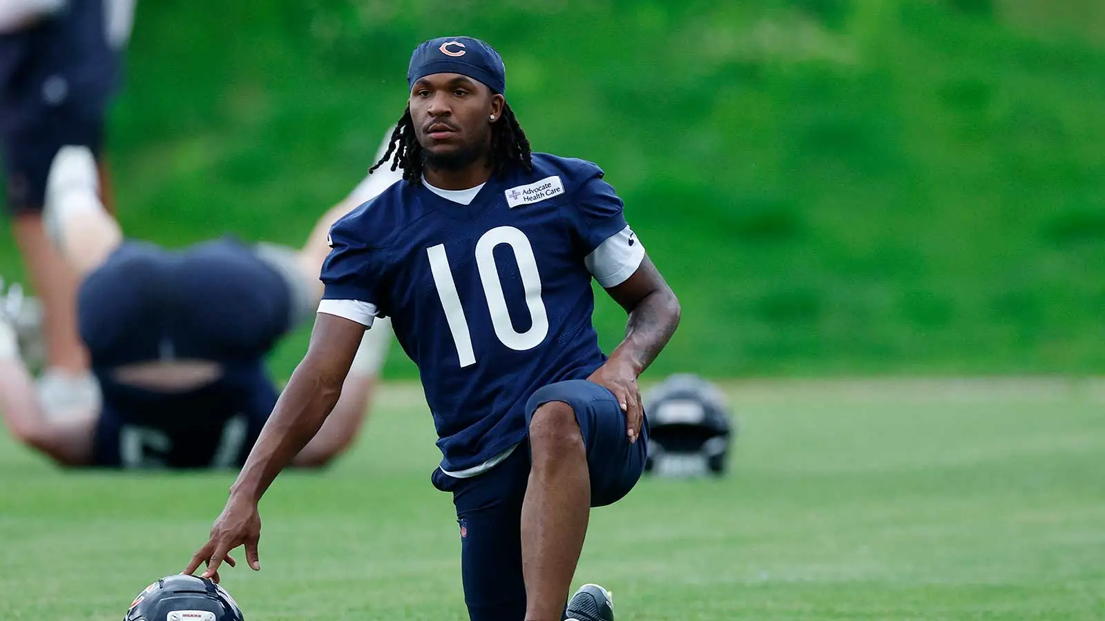 Jun 11, 2026; Lake Forest, IL, USA; Chicago Bears wide receiver Luther Burden III (10) stretches during Minicamp at Halas Hall. Mandatory Credit: Kamil Krzaczyn…