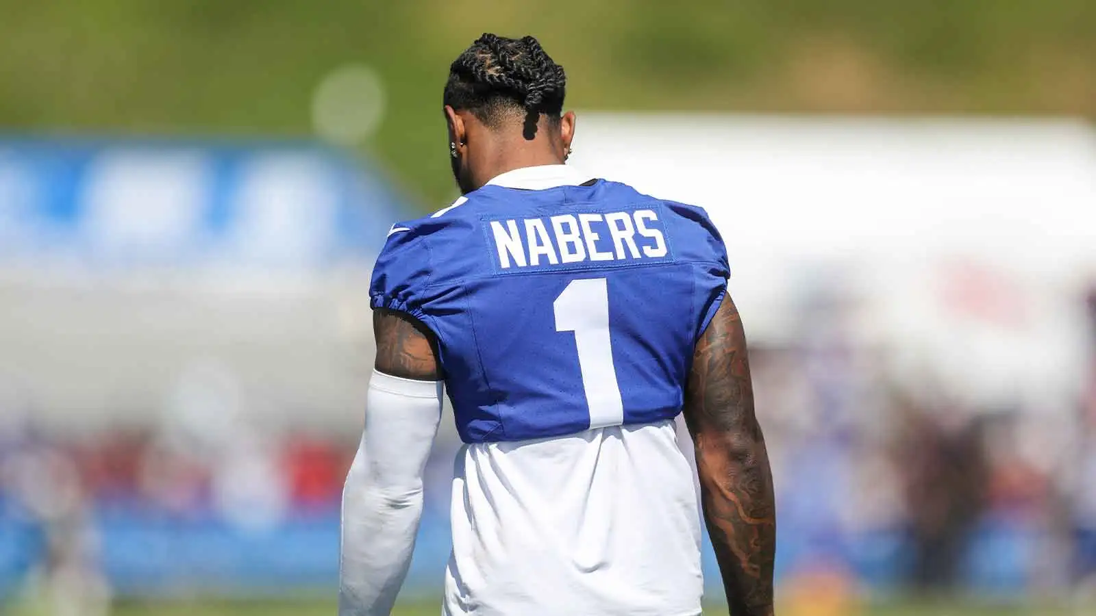 Jul 30, 2026; White Sulphur Springs, WV, USA; New York Giants wide receiver Malik Nabers (1) walks on the field after practice during training camp at The Green…