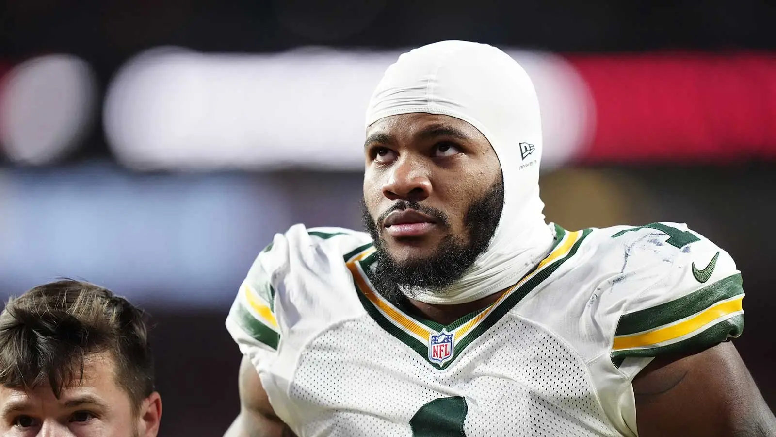 Dec 14, 2025; Denver, Colorado, USA; Green Bay Packers defensive end Micah Parsons (1) walks off the field with help from medical personnel following an injury…
