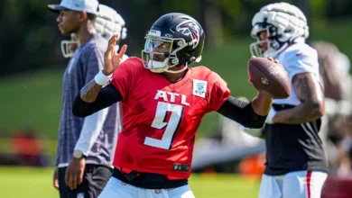 Jul 29, 2025; Atlanta, GA, USA; Atlanta Falcons quarterback Michael Penix Jr. (9) passes on the field during practice at training camp at IBM Performance Field.…