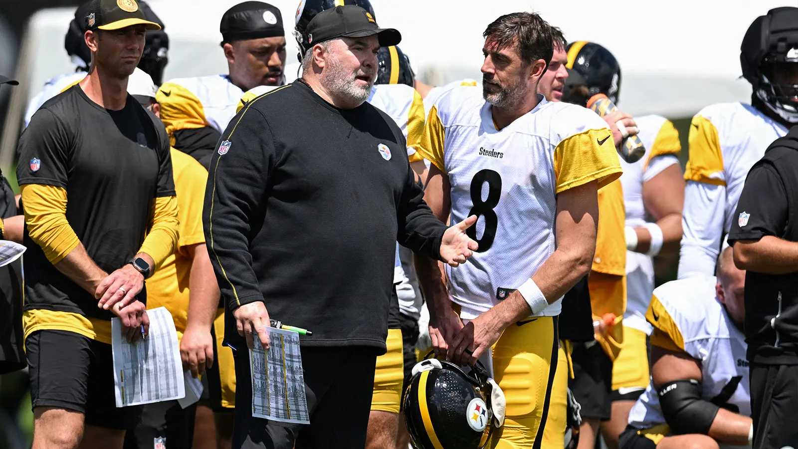 Aug 03, 2026; Latrobe, PA, USA; Pittsburgh Steelers head coach Mike McCarthy talks with quarterback Aaron Rodgers (8) during a practice session at Training camp…