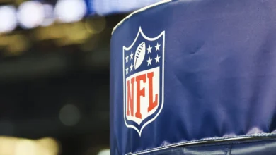 Dec 21, 2025; Arlington, Texas, USA; Detail of NFL logo on a goal post pad before a game between the Los Angeles Chargers and Dallas Cowboys at AT&T Stadium. Ma…