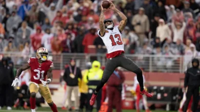 December 11, 2022; Santa Clara, California, USA; Tampa Bay Buccaneers wide receiver Mike Evans (13) catches the football against San Francisco 49ers safety Tash…