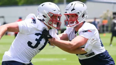 Jun 2, 2026; Foxborough, MA, USA; New England Patriots tight end Hunter Henry (85) does a drill with tight end Jack Westover (37) during the team's OTA at Gille…