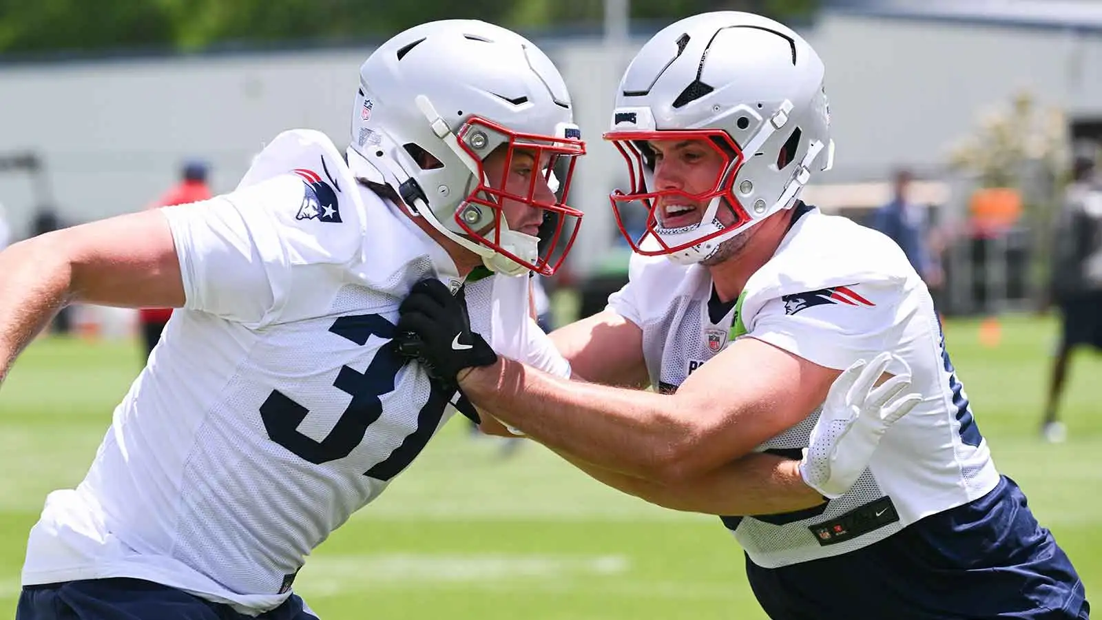 Jun 2, 2026; Foxborough, MA, USA; New England Patriots tight end Hunter Henry (85) does a drill with tight end Jack Westover (37) during the team's OTA at Gille…