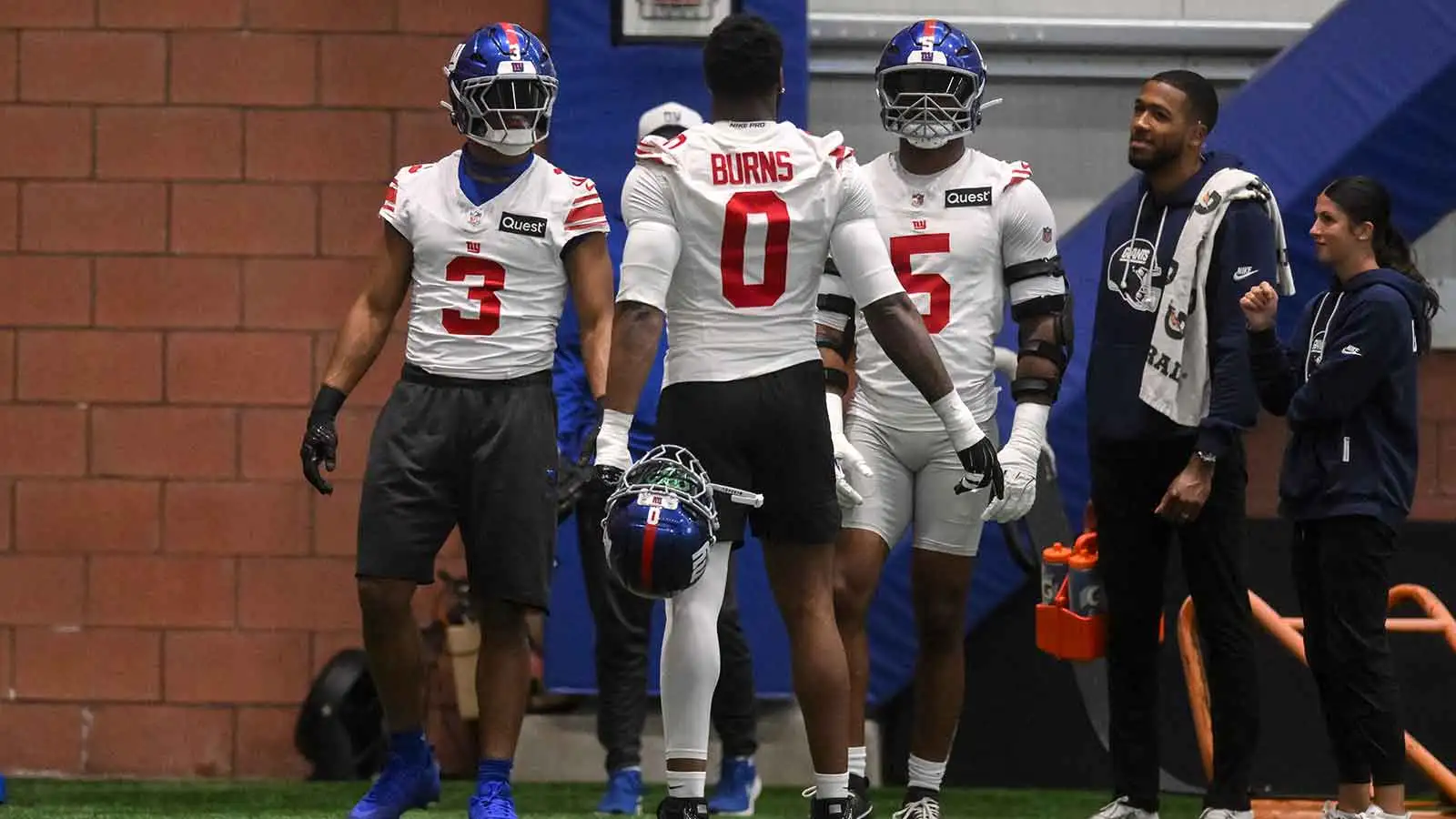 May 21, 2026; East Rutherford, NJ, USA; New York Giants outside linebacker Abdul Carter (3), linebacker Brian Burns (0) and linebacker Kayvon Thibodeaux (5) tal…