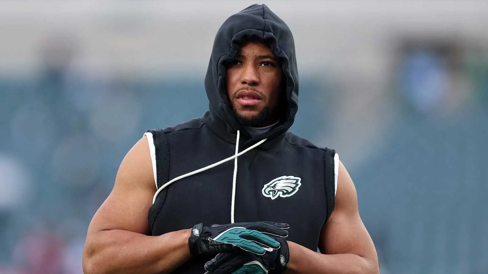 Jan 11, 2026; Philadelphia, PA, USA; Philadelphia Eagles running back Saquon Barkley (26) looks on during warmups prior to an NFC Wild Card Round game against t…