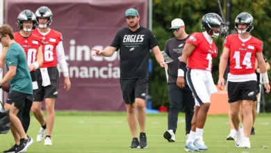 Jul 30, 2026; Philadelphia, PA, USA; Philadelphia Eagles offensive coordinator Sean Mannion and quarterbacks Jalen Hurts (1) and Andy Dalton (14) and Cole Payto…