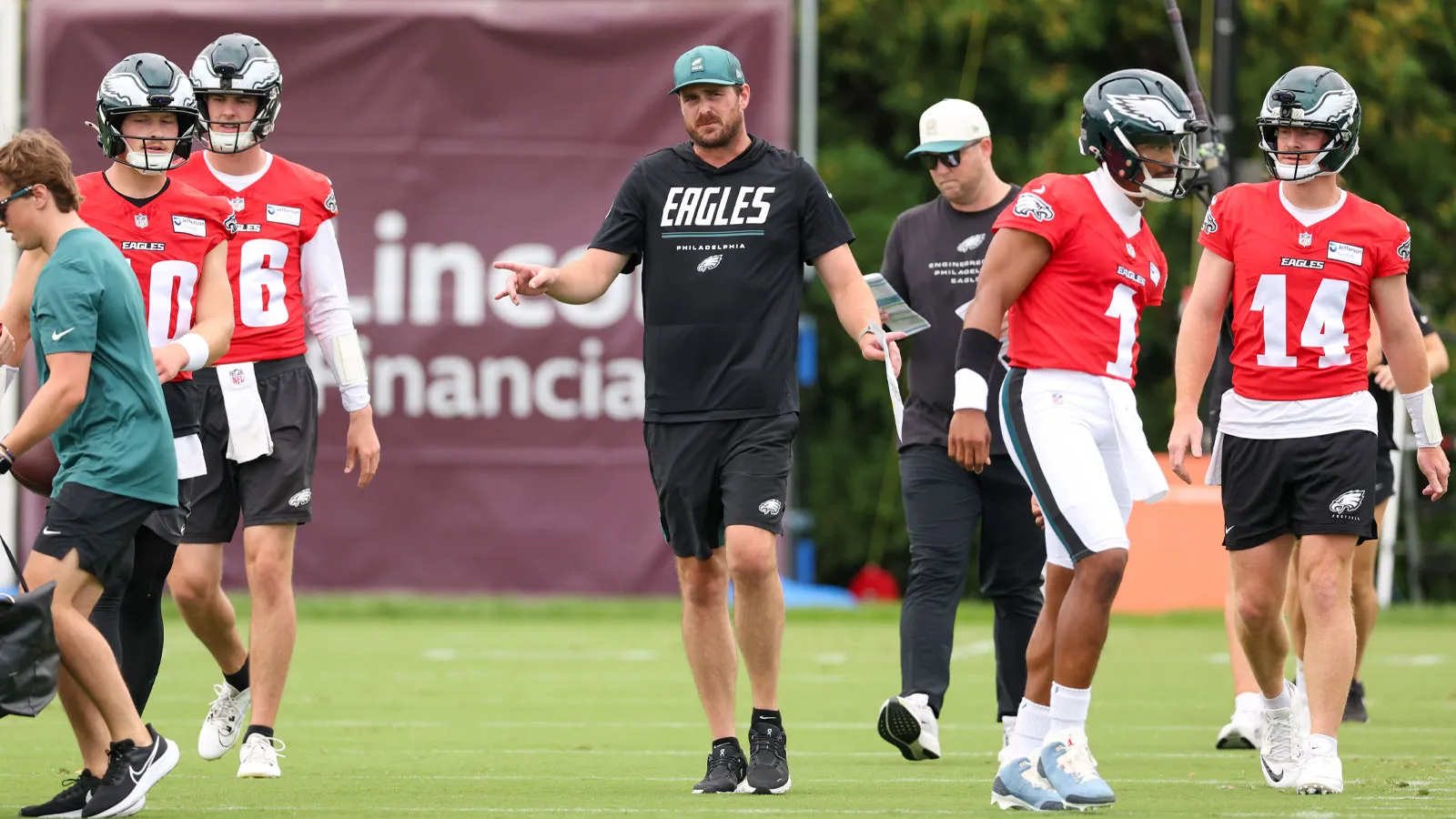 Jul 30, 2026; Philadelphia, PA, USA; Philadelphia Eagles offensive coordinator Sean Mannion and quarterbacks Jalen Hurts (1) and Andy Dalton (14) and Cole Payto…