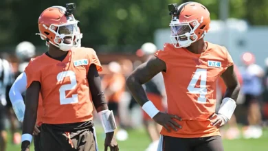 Jul 30, 2026; Berea, OH, USA; Cleveland Browns quarterback Shedeur Sanders (2) and quarterback Deshaun Watson (4) talk during training camp at CrossCountry Mort…