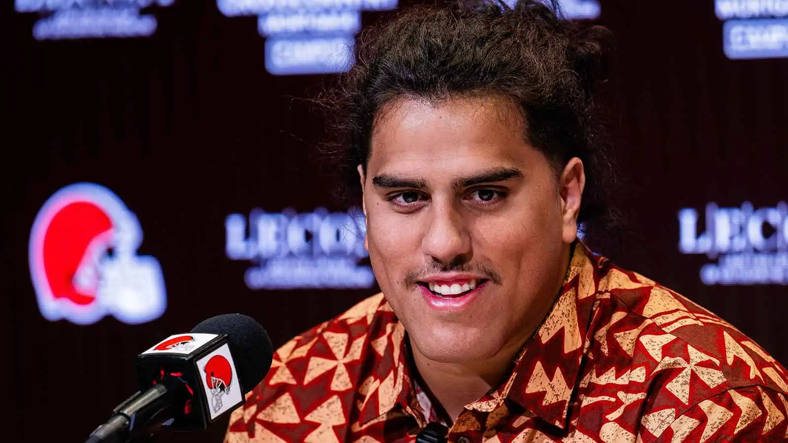 Apr 24, 2026; Berea, OH, USA; Cleveland Browns first round draft pick Spencer Fano talks to the media during an introductory press conference at CrossCountry Mo…