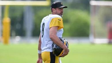 Aug 03, 2026; Latrobe, PA, USA; Pittsburgh Steelers quarterback Aaron Rodgers (8) takes the field for a practice session at Training camp at Saint Vincent Colle…