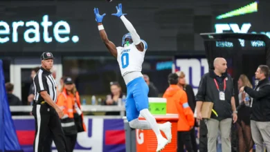 Aug 8, 2024; East Rutherford, New Jersey, USA; Detroit Lions cornerback Terrion Arnold (0) makes a catch during warmup prior to the game between the New York Gi…