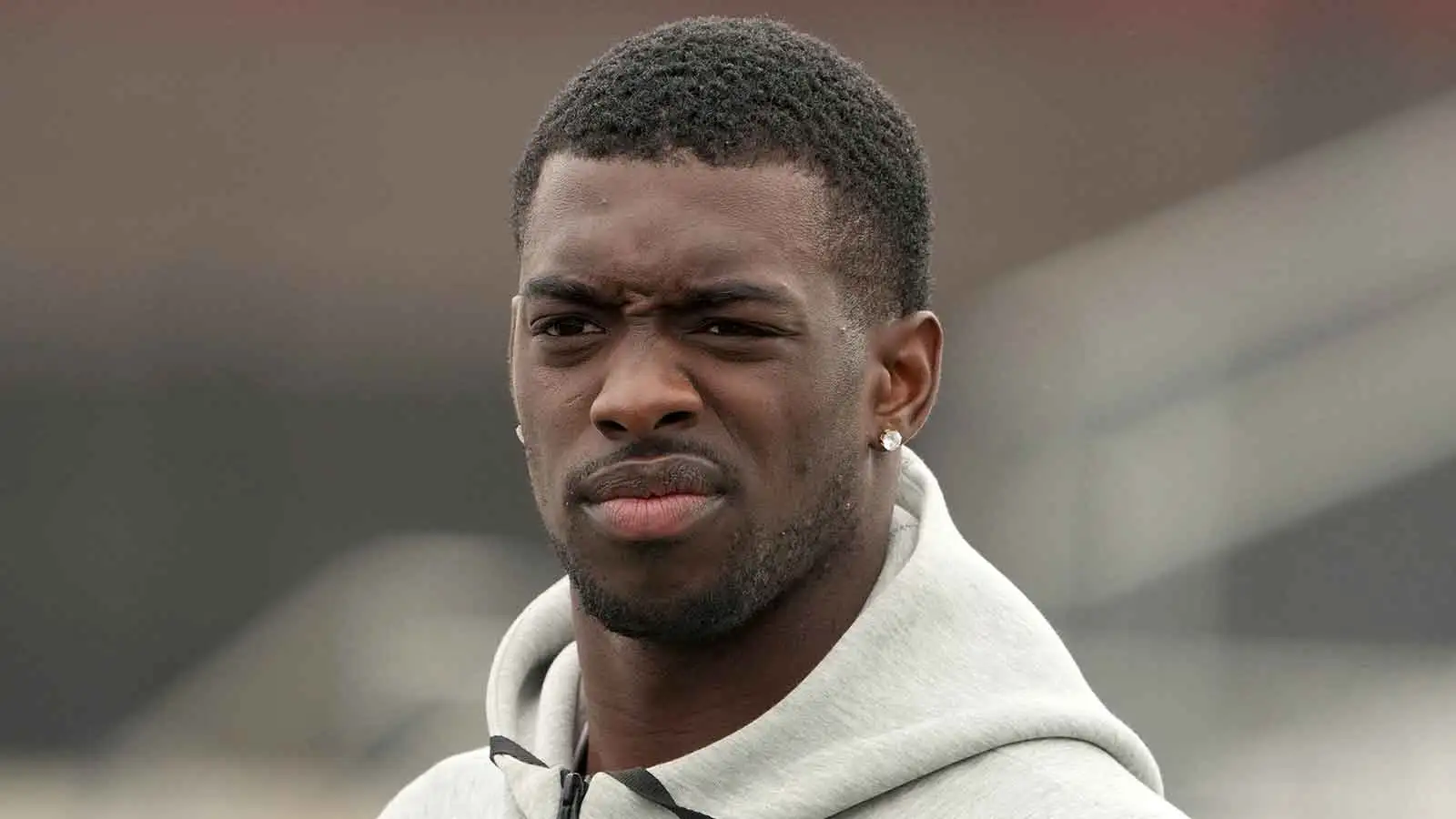 Apr 24, 2024; Detroit, MI, USA; Alabama Crimson Tide cornerback Terrion Arnold reacts at the Play Football Prospect Clinic at The Corner Ballpark. Mandatory Cre…