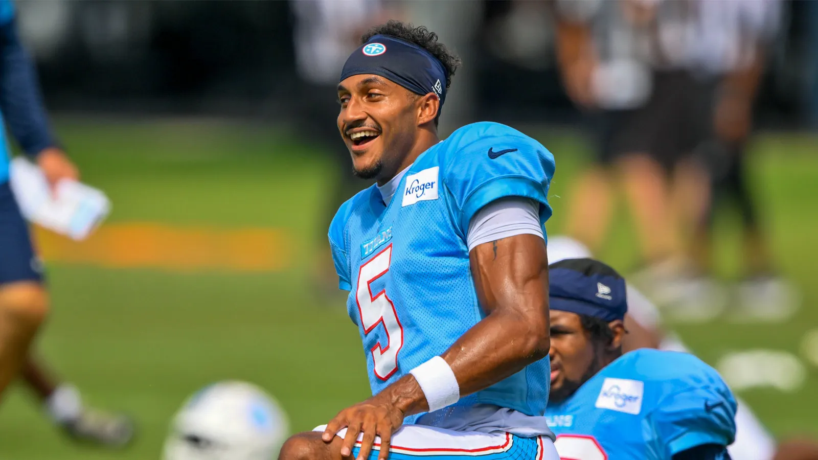 Aug 4, 2026; Nashville, TN, USA; Tennessee Titans wide receiver Elic Ayomanor (5) stretches during training camp at Vanderbilt Health Football Center. Mandatory…