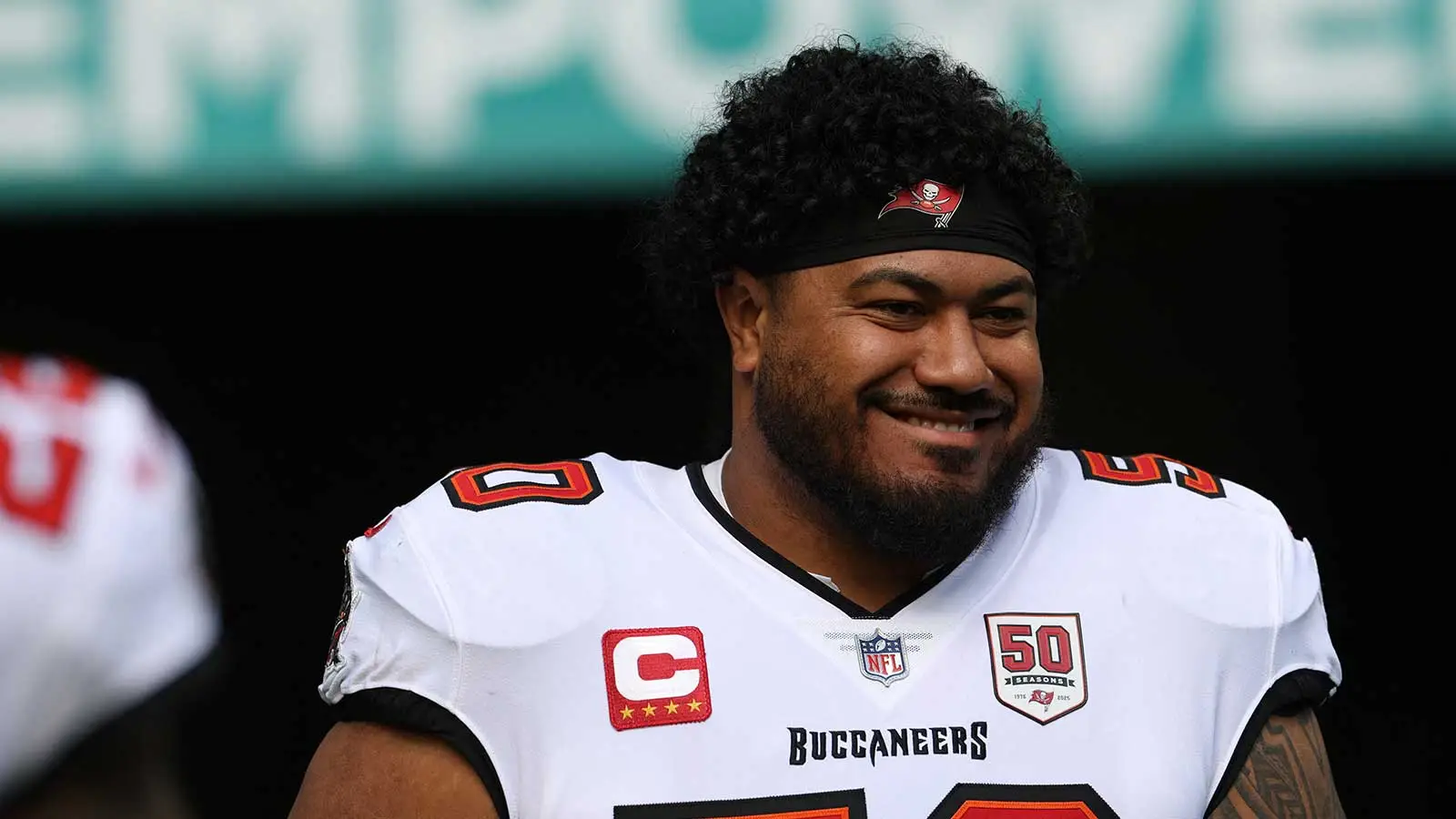 Dec 28, 2025; Miami Gardens, Florida, USA; Tampa Bay Buccaneers defensive tackle Vita Vea (50) walks out for player introductions prior to a game against the Mi…