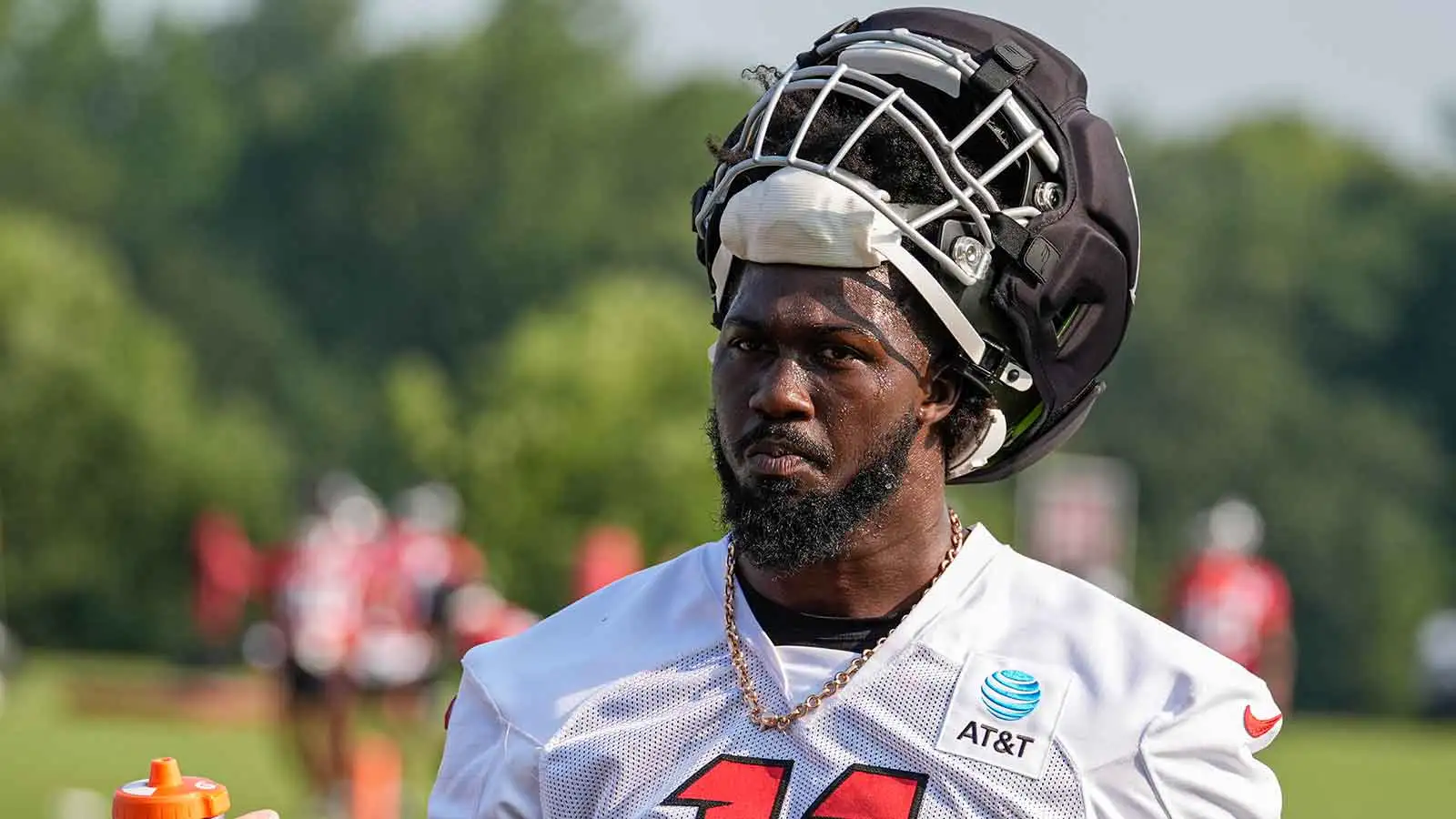 Jul 30, 2026; Atlanta, Falcons, USA; Atlanta Falcons linebacker Jalon Walker (11) takes a break on the field during training camp at IBM Performance Field. Mand…