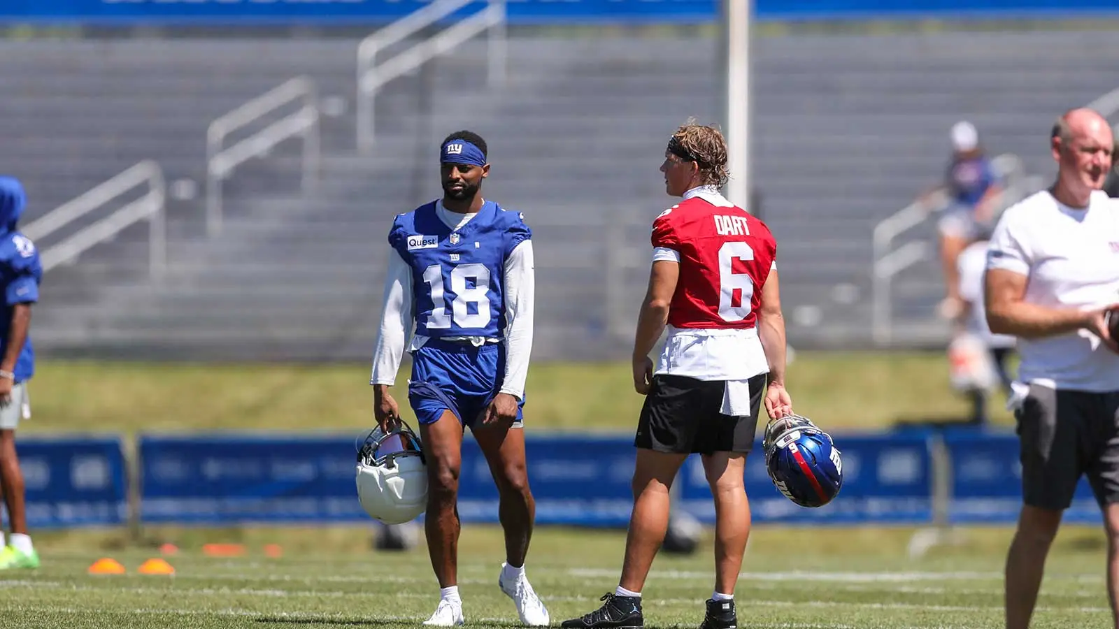 Jul 30, 2026; White Sulphur Springs, WV, USA; New York Giants wide receiver Darius Slayton (18) talks with New York Giants quarterback Jaxson Dart (6) during tr…