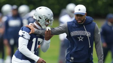 May 1, 2026; Frisco, TX, USA; Dallas Cowboys cornerback Caleb Downs (18) is coached through a drill with defensive coordinator Christian Parker at the Ford Cent…