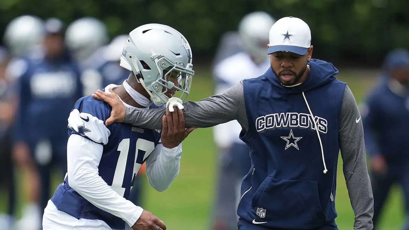 May 1, 2026; Frisco, TX, USA; Dallas Cowboys cornerback Caleb Downs (18) is coached through a drill with defensive coordinator Christian Parker at the Ford Cent…