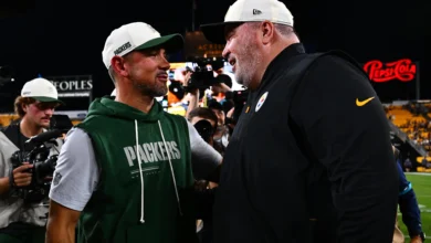 PITTSBURGH, PENNSYLVANIA - AUGUST 13: Head coach Matt LaFleur of the Green Bay Packers (L) talks with head coach Mike McCarthy of the Pittsburgh Steelers after…