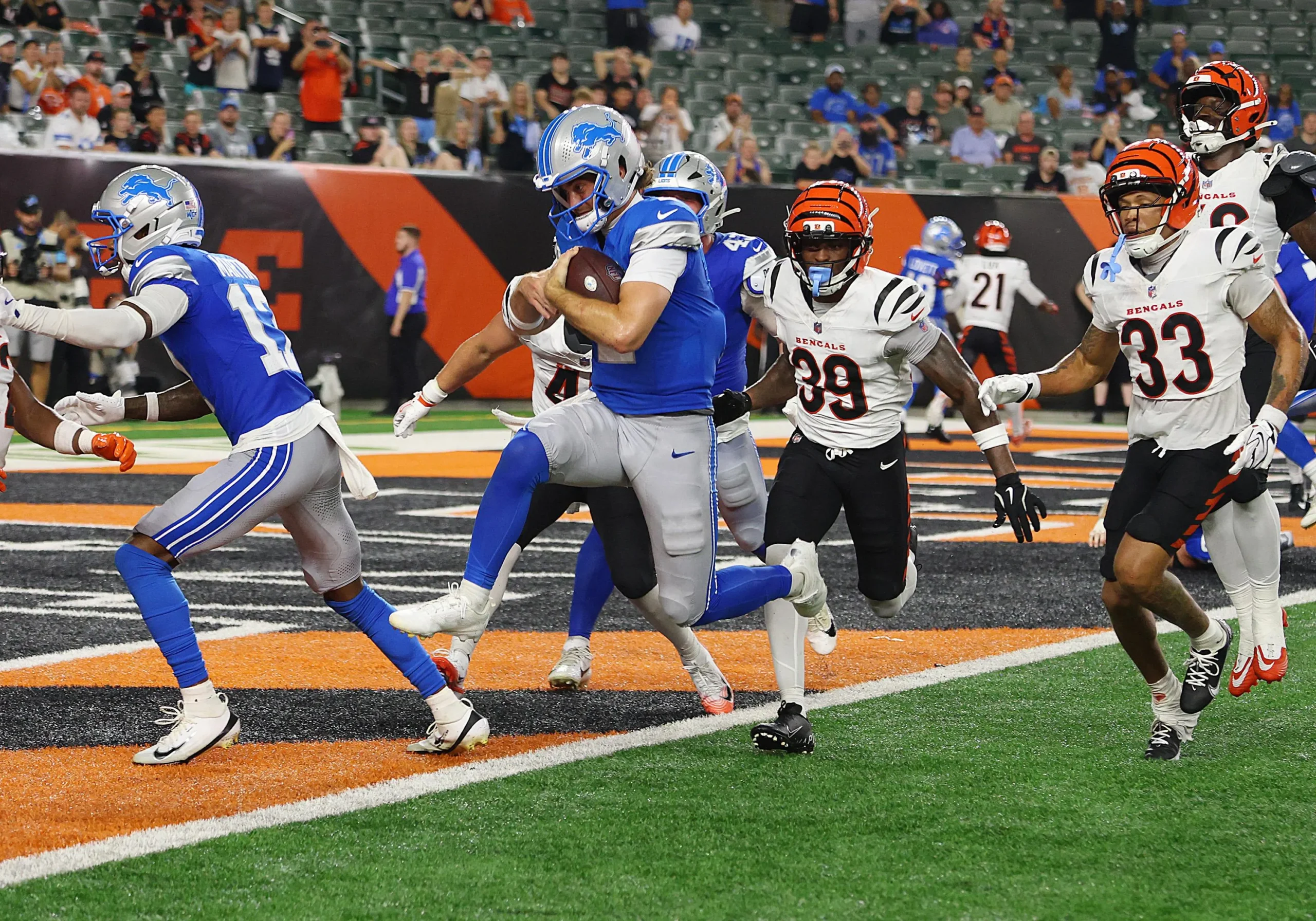CINCINNATI, OH - AUGUST 13: Quarterback Luke Altmyer #2 of the Detroit Lions runs for a 2-point conversion in a preseason game between the Detroit Lions and the…